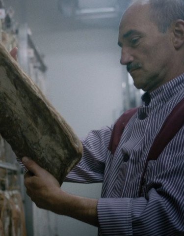 Man looking at meat